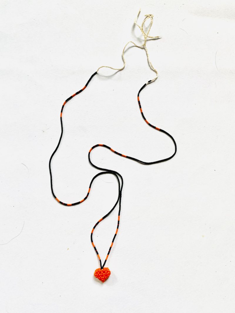 Kamayura People: Orange and Black Handcrafted Heart Necklace - Image 4